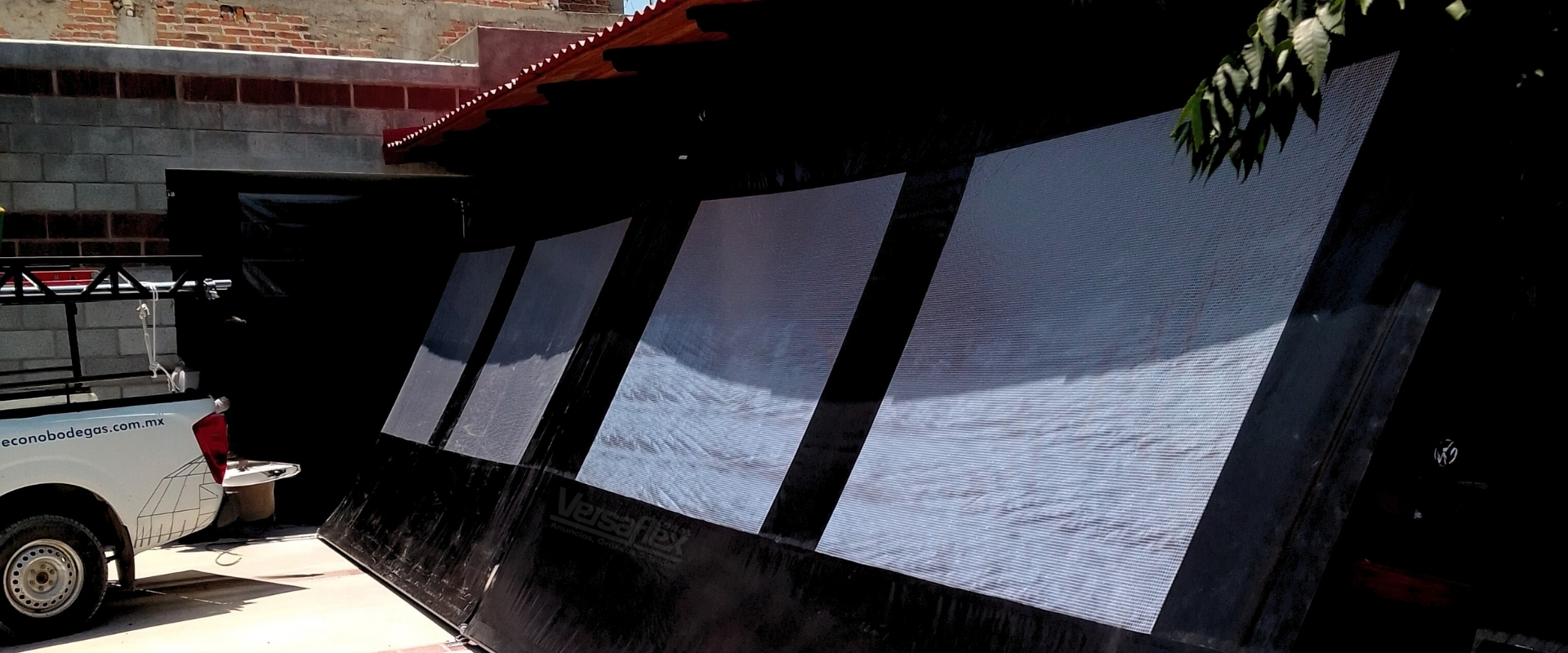 Cortinas de lona y malla Versaflex